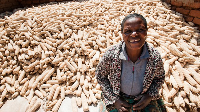 Veronica, a farmer in Tanzania, with her maize crop. © Hailey Tucker, 2015 CGAP Photo Contest